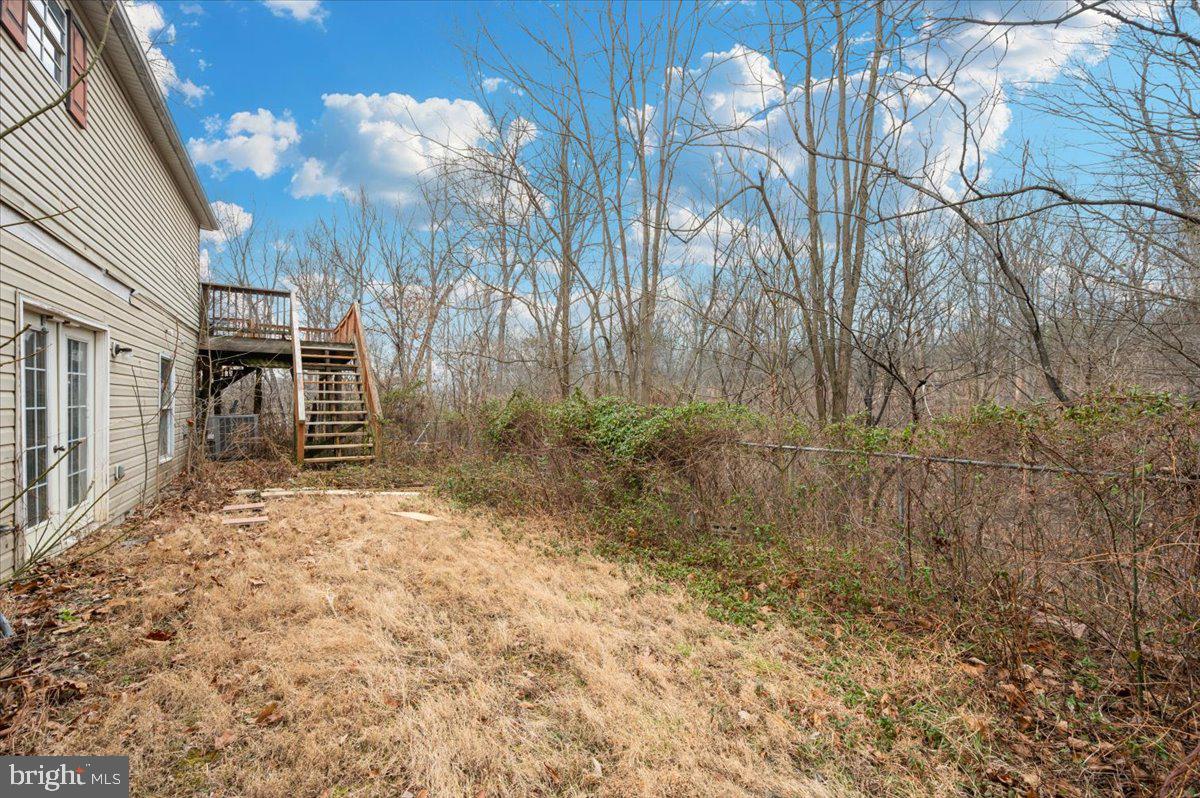 105 Relative Way Falling Waters, WV 25419 - Photo 30 of 42 a backyard of a house