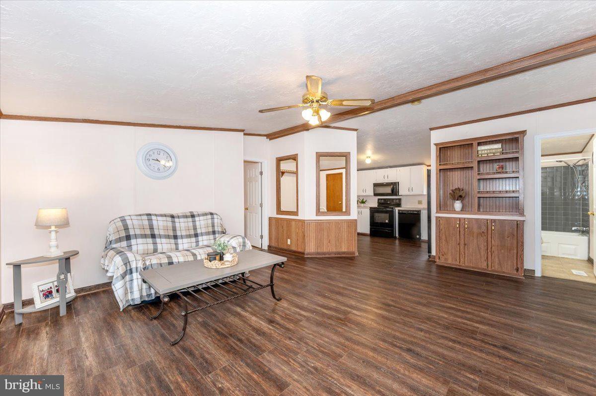 105 Relative Way Falling Waters, WV 25419 - Photo 5 of 42 a living room with furniture and wooden floors