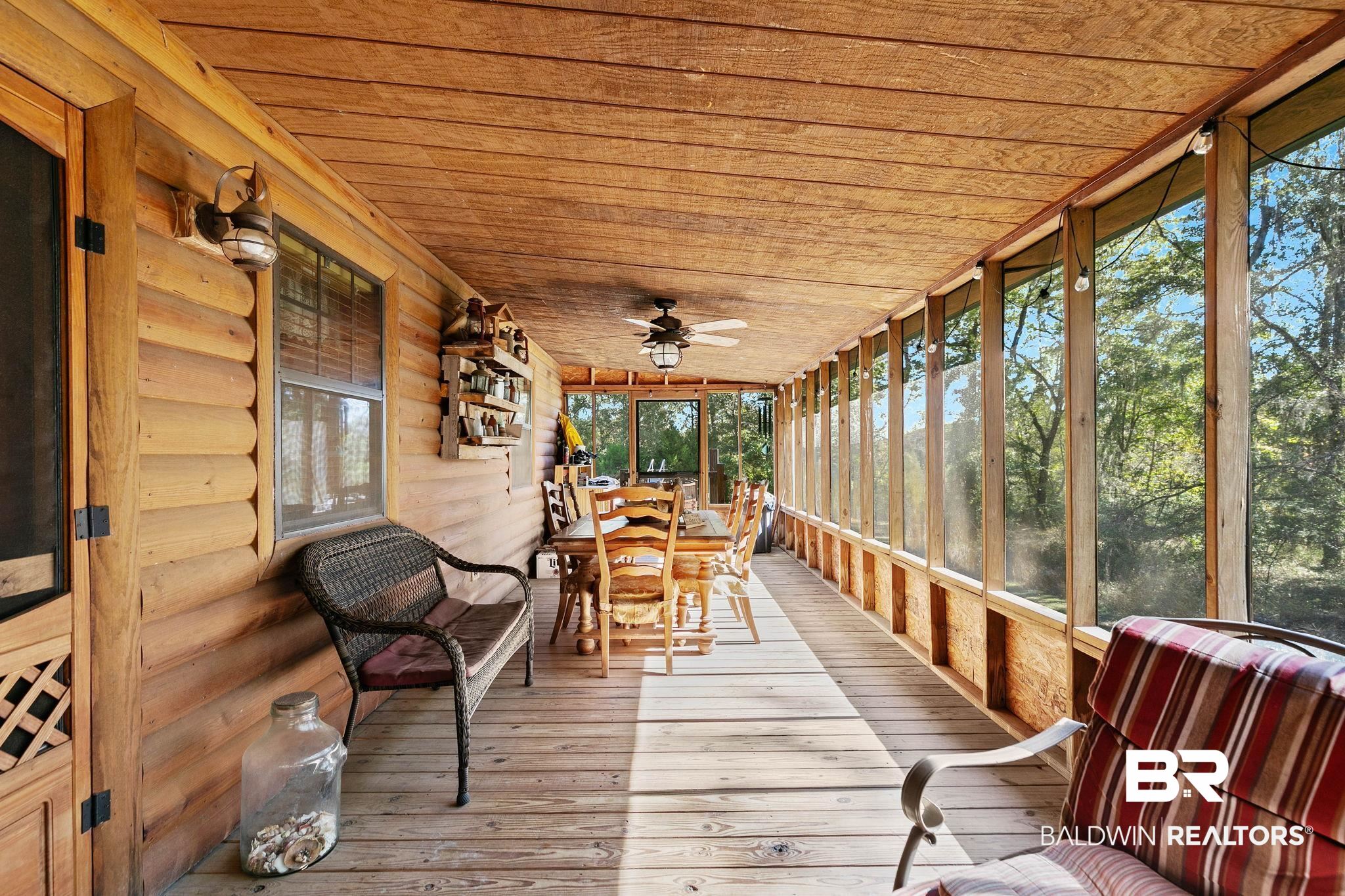 724 Rowell Lane Brewton, AL 36426 - Photo 24 of 40 Sunroom / solarium featuring a ceiling fan