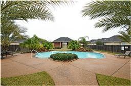 20919 Sunrise Pine View Lane Katy, TX 77450 - Photo 22 of 22 a view of swimming pool and lake