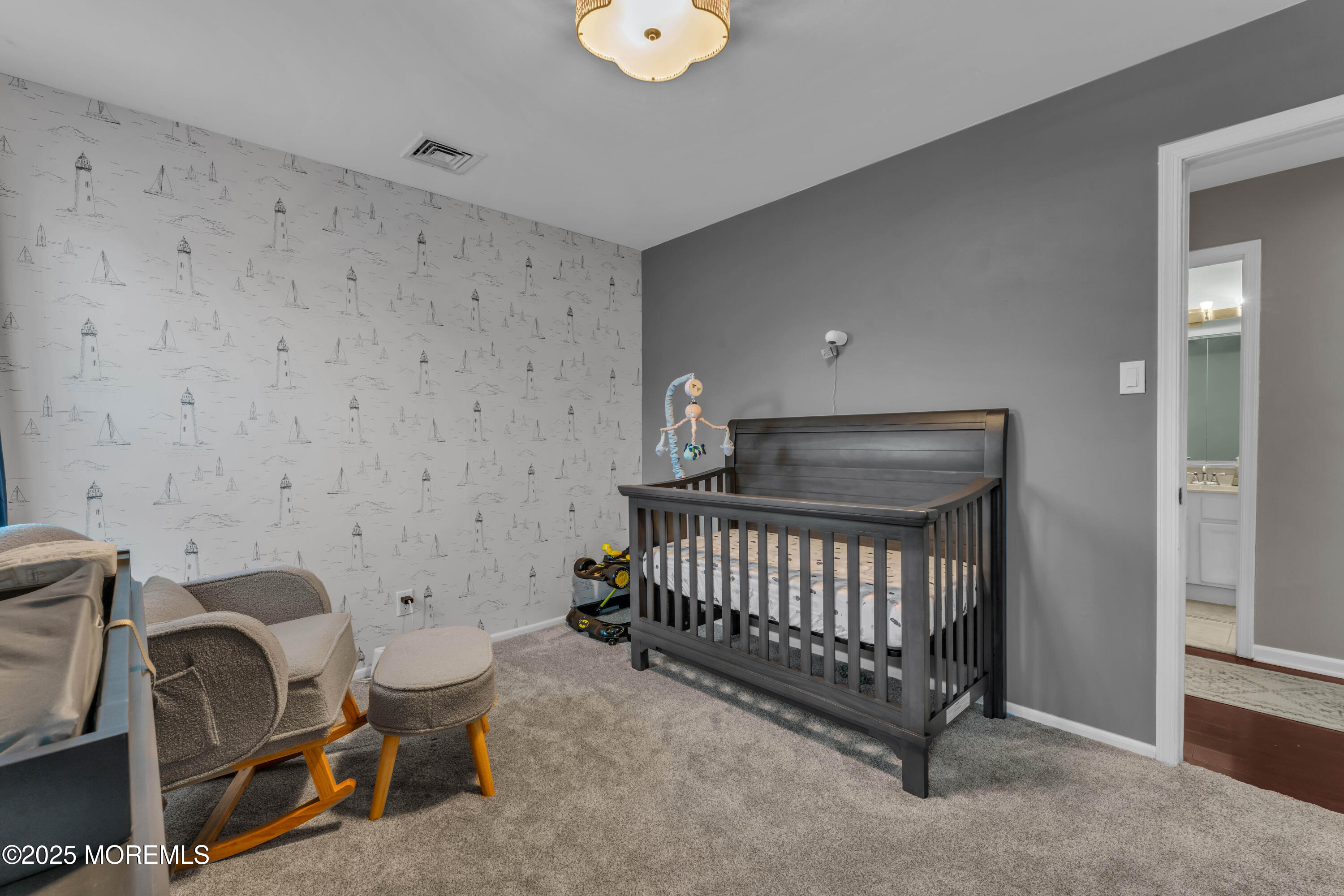 38 Kiwi Loop Howell, NJ 07731 - Photo 19 of 32 a bedroom with a chair and a window