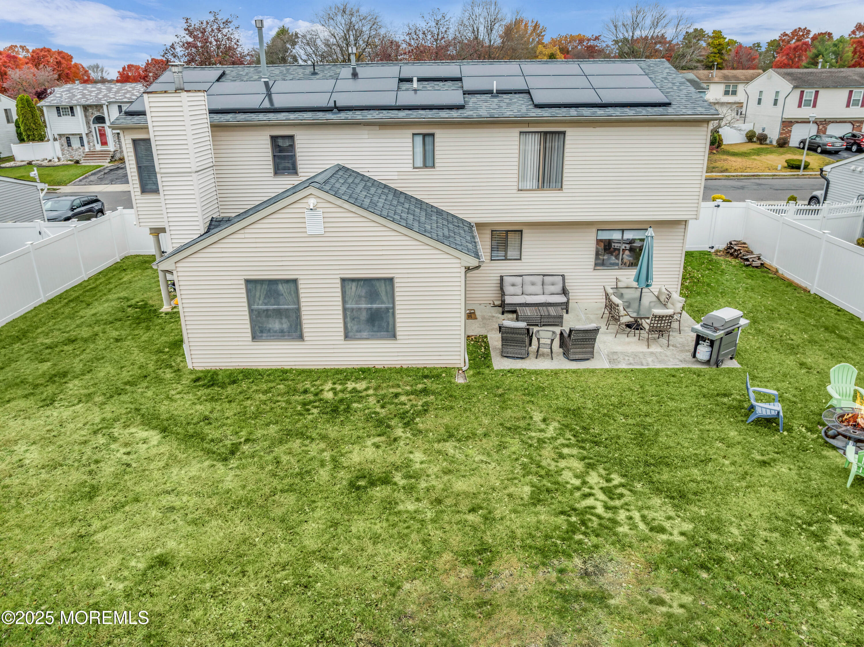 38 Kiwi Loop Howell, NJ 07731 - Photo 26 of 32 a view of a back yard of the house
