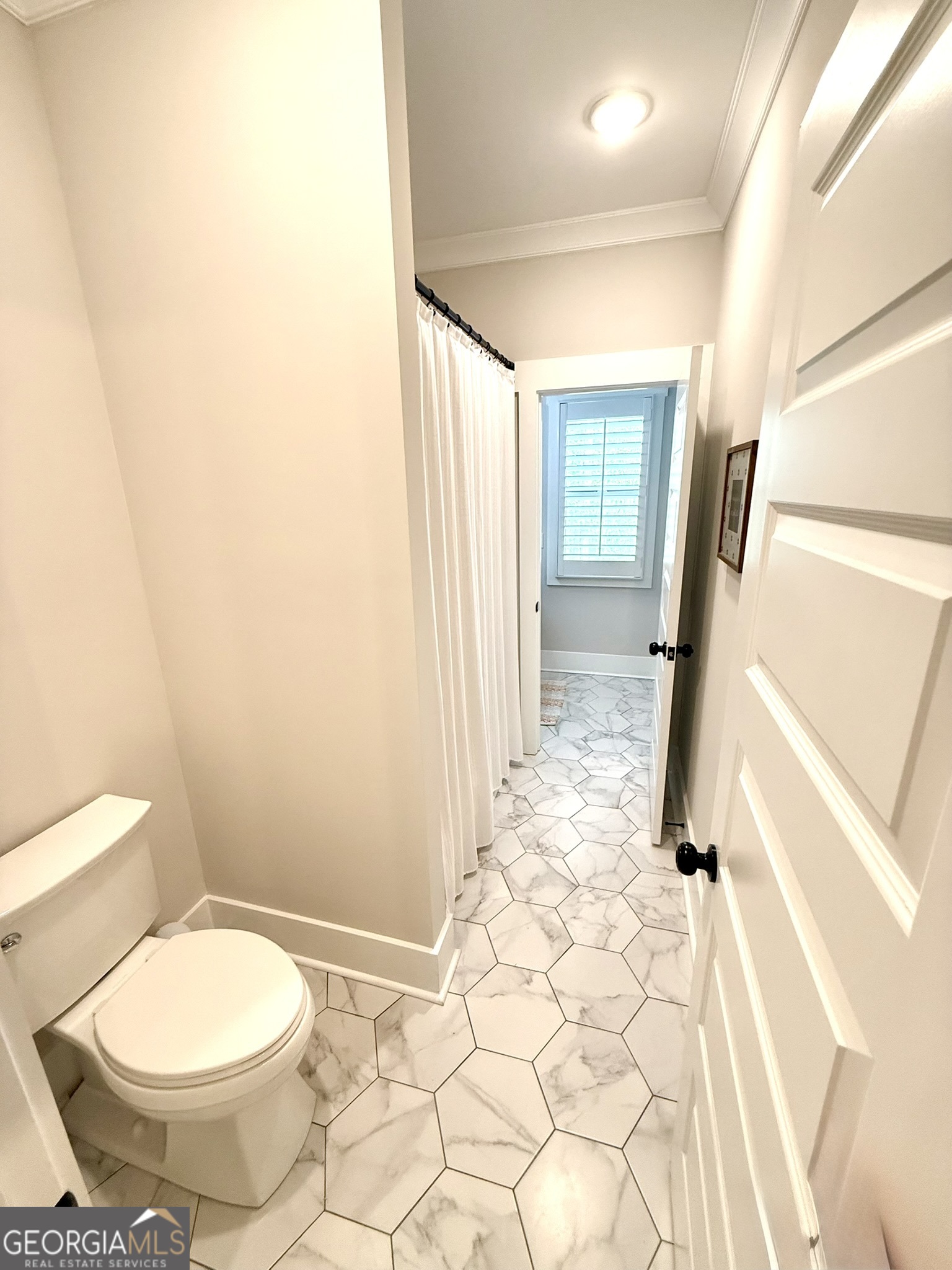 120 Spring Creek Drive Rutledge, GA 30663 - Photo 33 of 38 a bathroom with a toilet and a shower