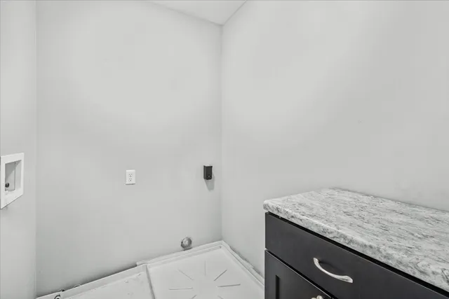 a utility room with a sink