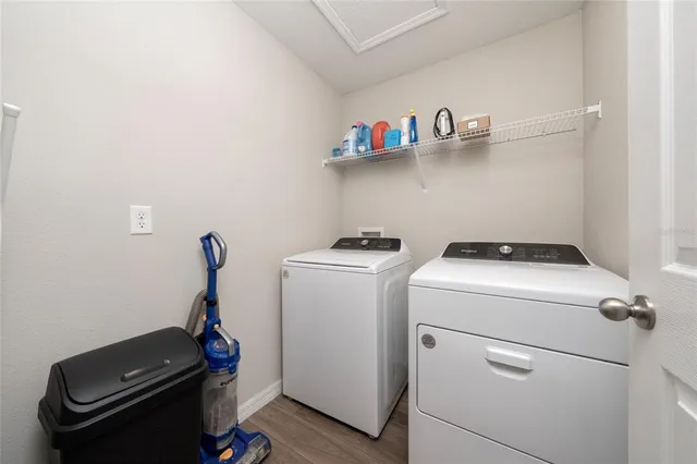 a utility room with dryer and washer