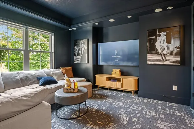 a open kitchen with a refrigerator and sink