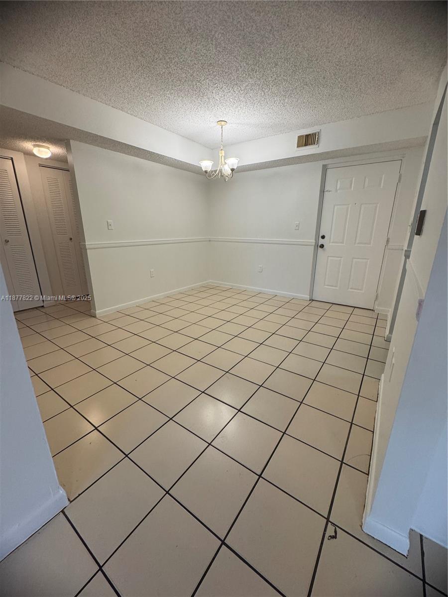 5765 West 25th Court, Unit 206 Hialeah, FL 33016 - Photo 3 of 12 a view of a garage