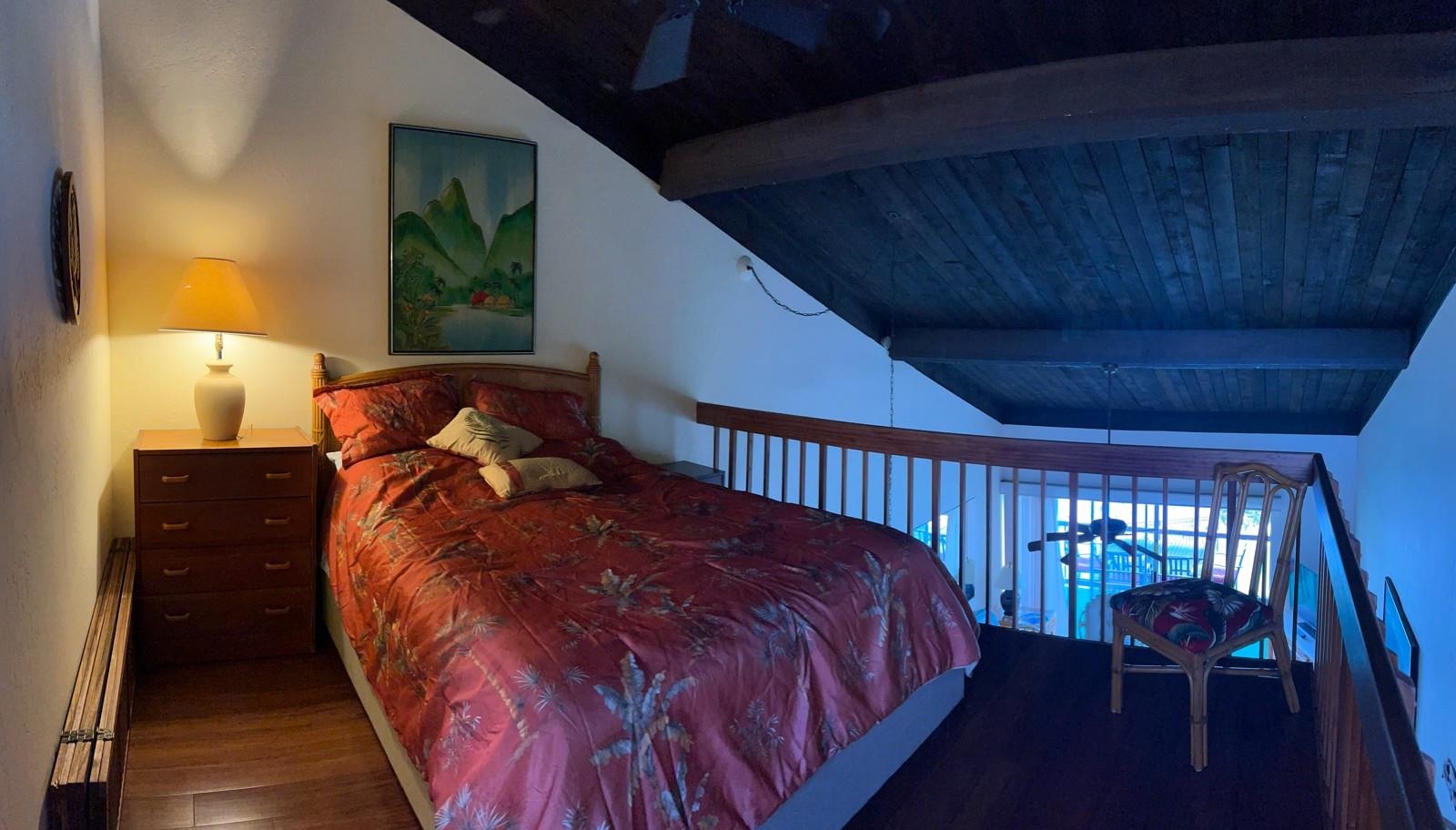 2737 South Kihei Road, Unit 336 Kihei, HI 96753 - Photo 23 of 38 a bed sitting in a bedroom next to a window