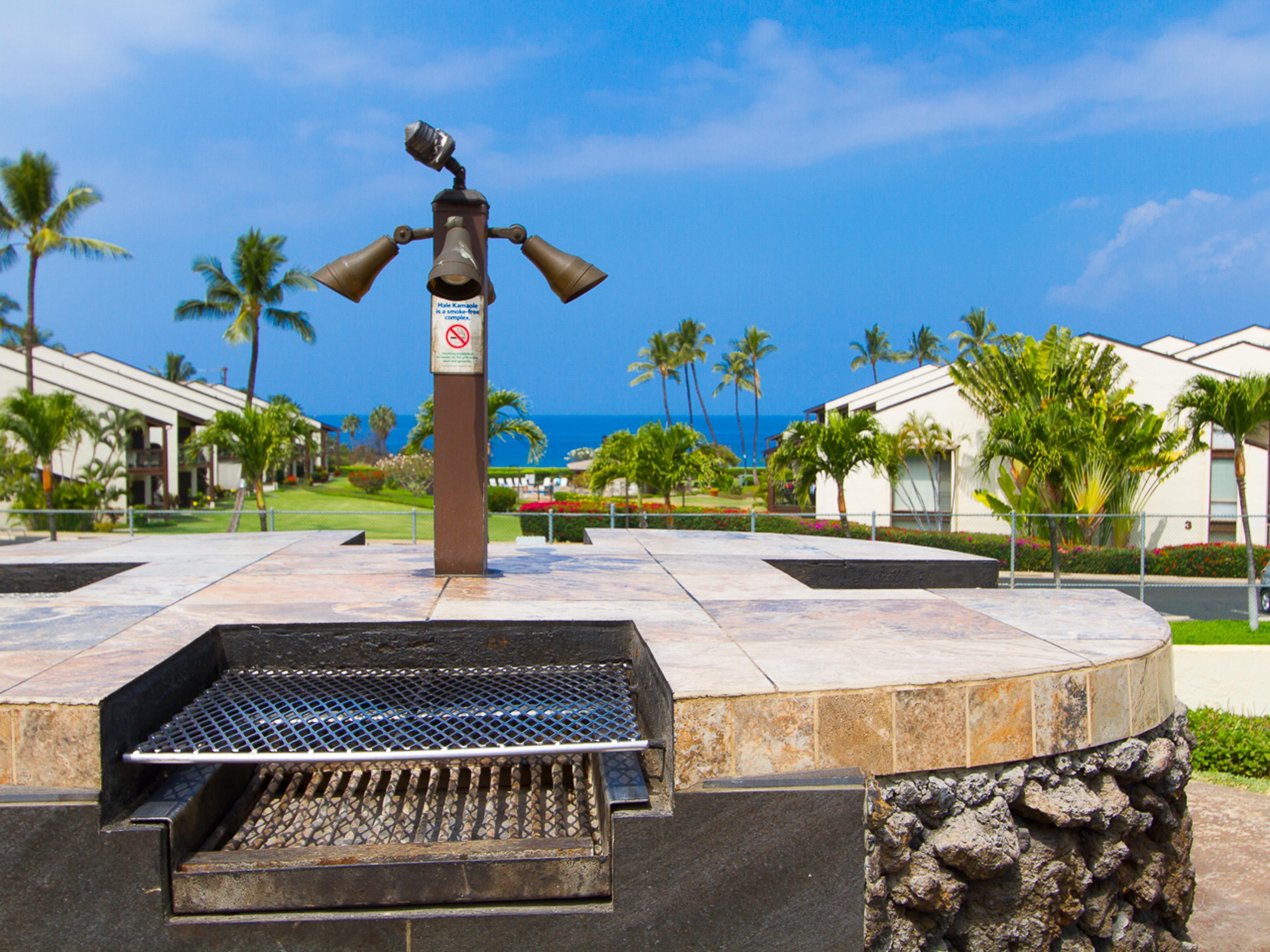 2737 South Kihei Road, Unit 336 Kihei, HI 96753 - Photo 37 of 38 a front view of a house with a yard and trees