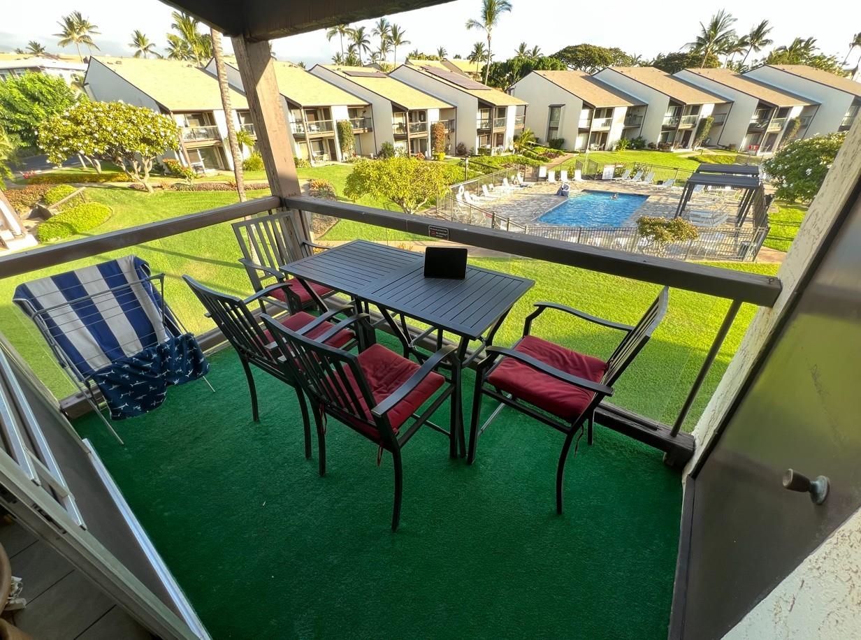 2737 South Kihei Road, Unit 336 Kihei, HI 96753 - Photo 4 of 38 a view of an chairs and table in the patio