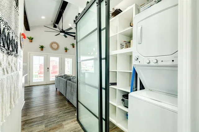 a kitchen with a sink stainless steel appliances and cabinets
