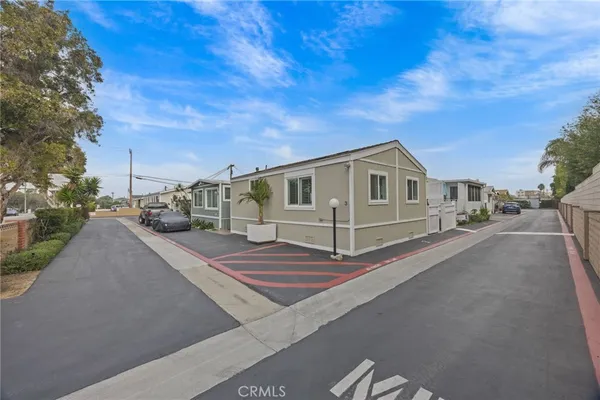 a view of a house with a road