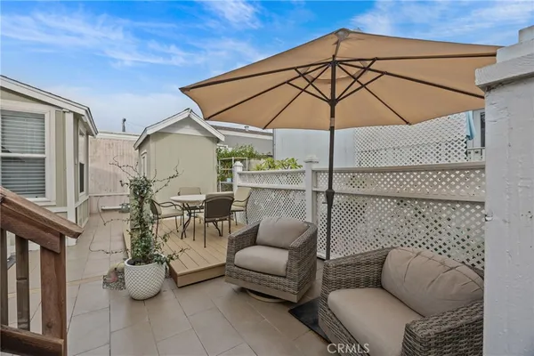 a balcony with furniture