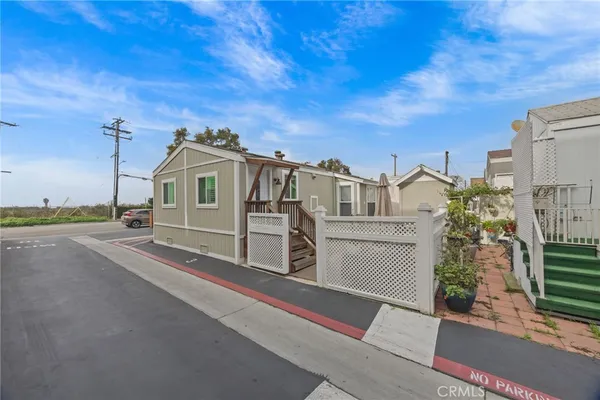 a view of a house with a street