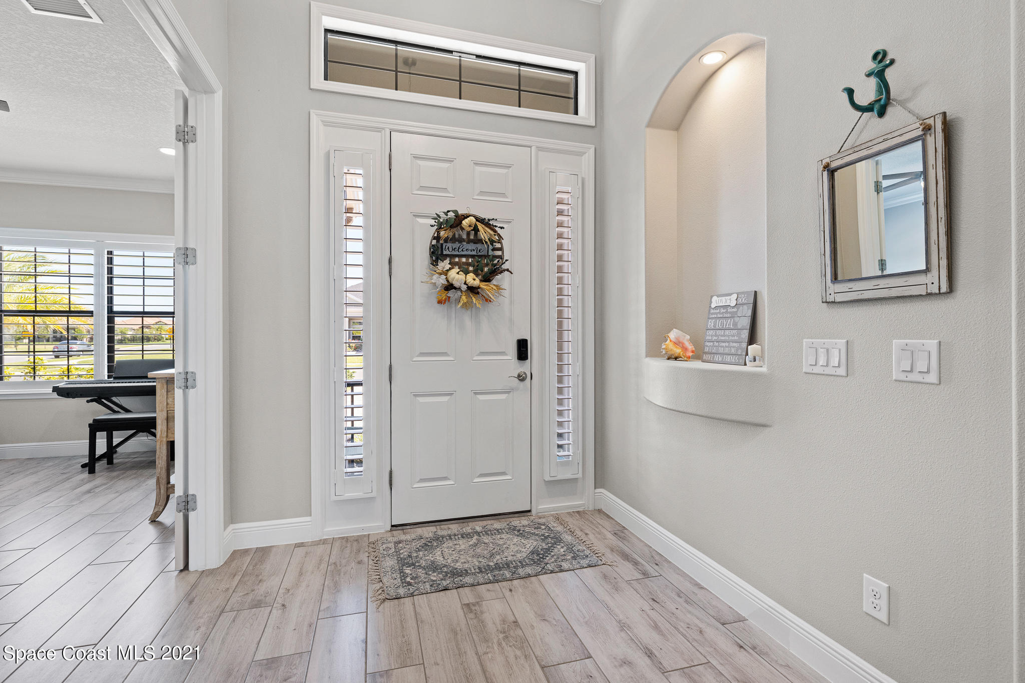 7689 Kerrington Drive Melbourne, FL 32940 - Photo 5 of 36 024A3404