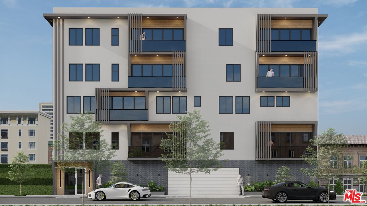 1900 Holmby Avenue Los Angeles, CA 90025 - Photo 3 of 8 a front view of a building with glass windows