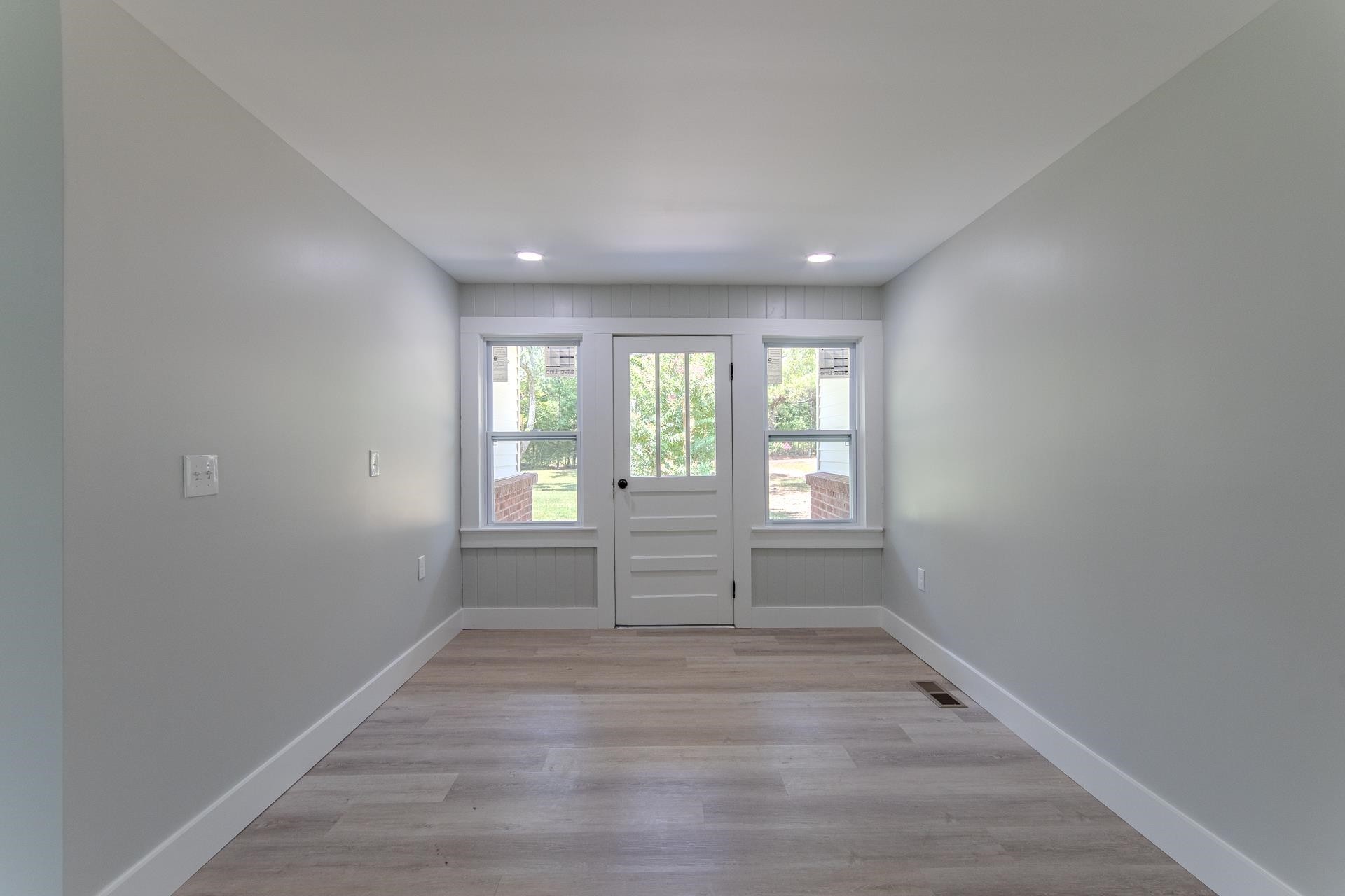 6800 Glendale Road Morris Chapel, TN 38361 - Photo 8 of 36 wooden floor in an empty room with a window