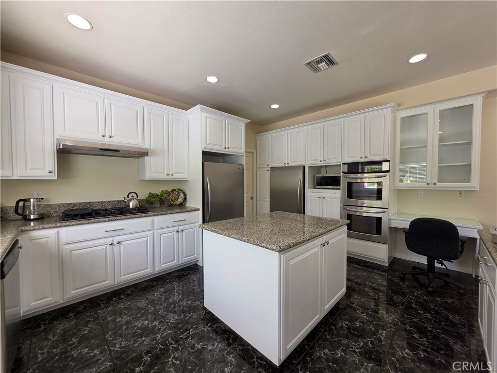 11541 Donovan Road Rossmoor, CA 90720 - Photo 36 of 113 spacious island with cabinetry access on 2 sides