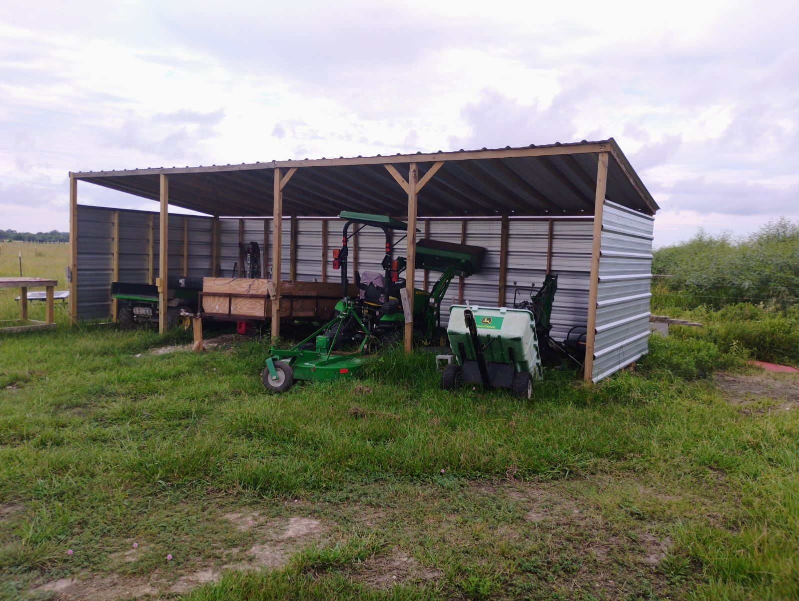 6620 Eagle Road Anahuac, TX 77514 - Photo 3 of 6 a view of a house with a backyard and chairs
