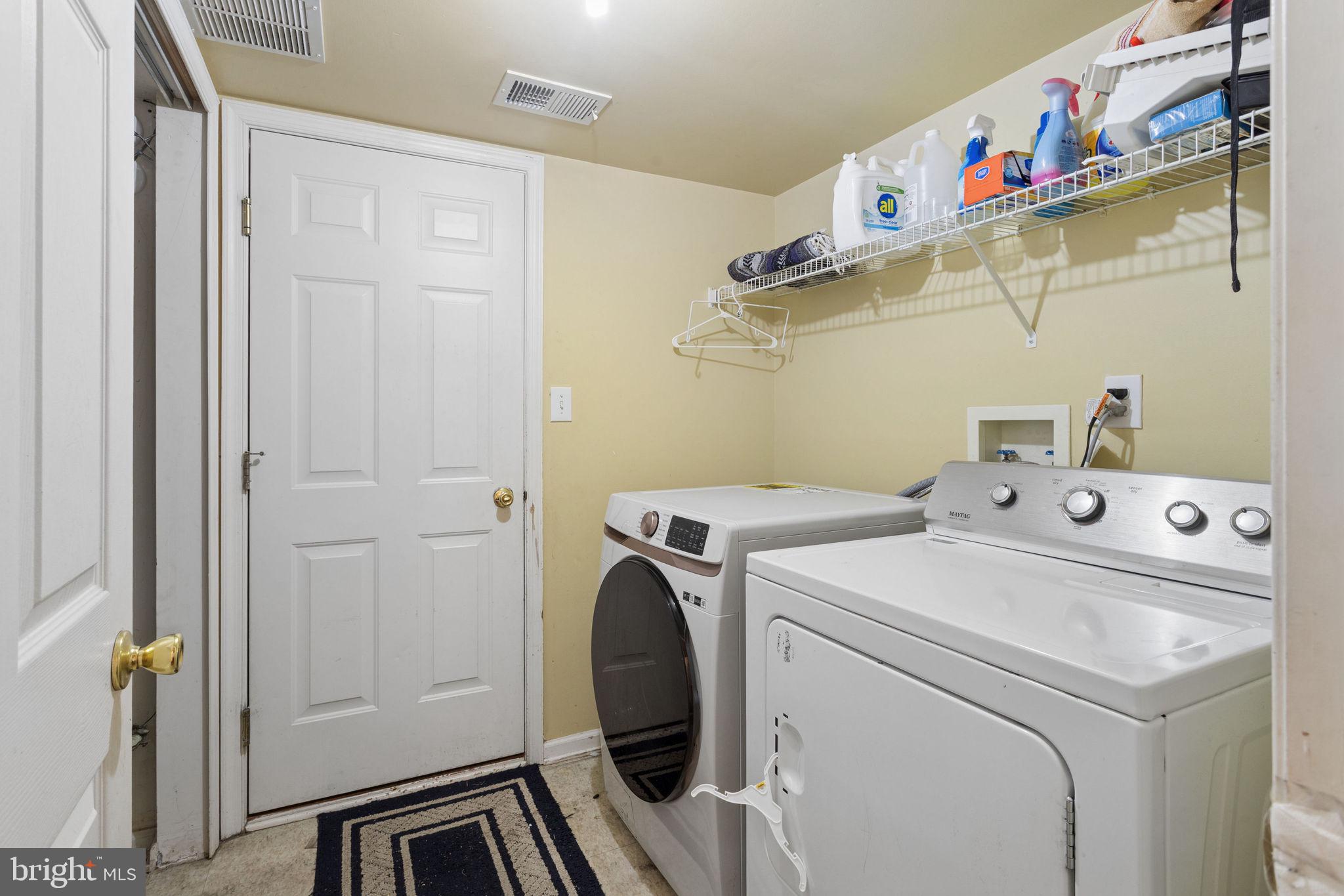 18 Hemingway Lane Columbus, NJ 08022 - Photo 9 of 27 Functional laundry space with storage.