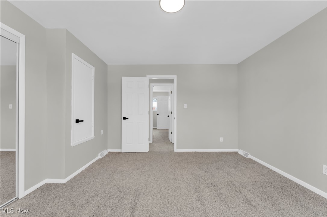 797 Babbitt Road, Unit 15 Euclid, OH 44123 - Photo 16 of 22 Unfurnished bedroom with light carpet and baseboards