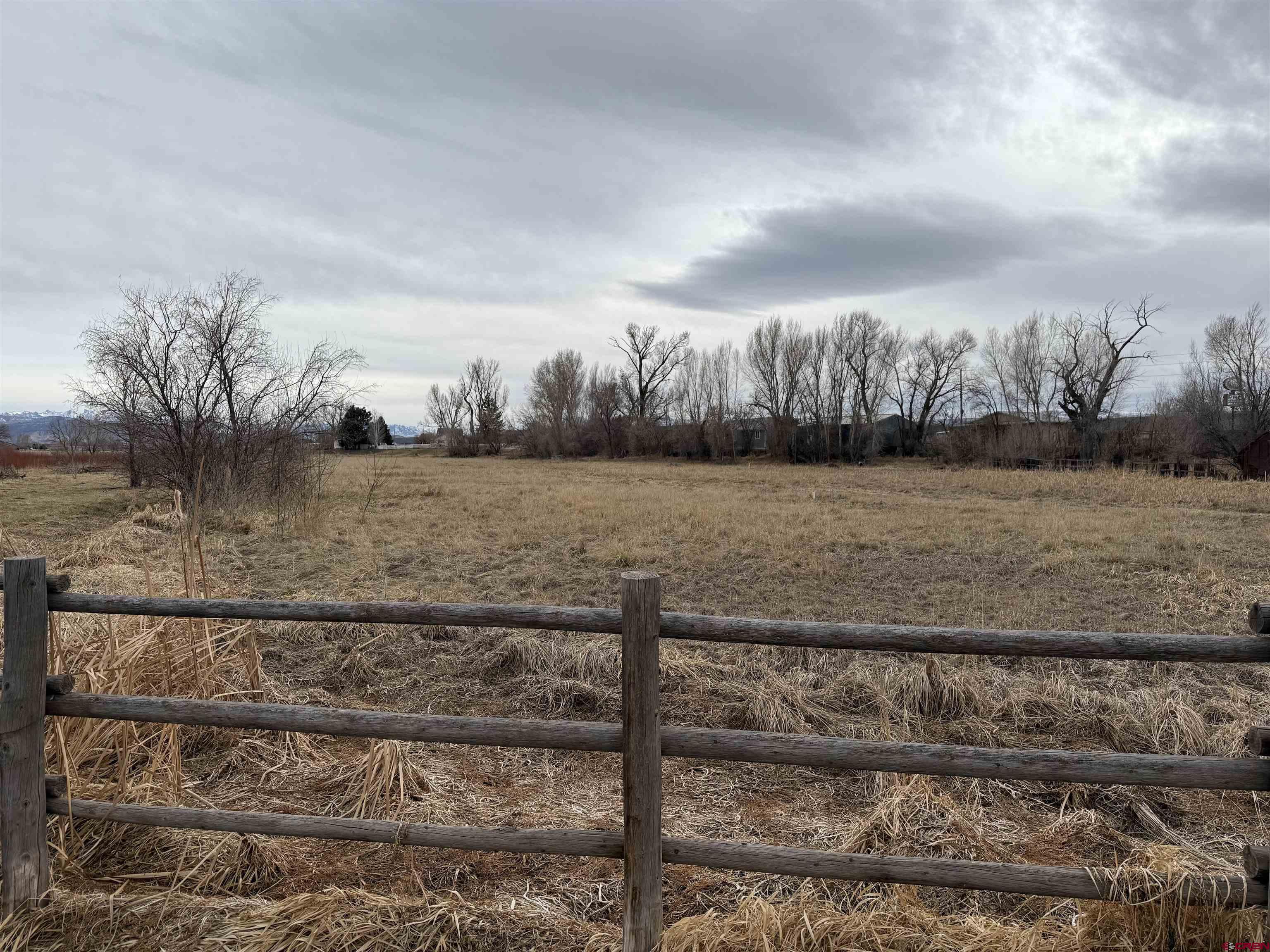 Tbd Riverside Road Montrose, CO 81401 - Photo 4 of 5 a view of a pathway with a wrought fence