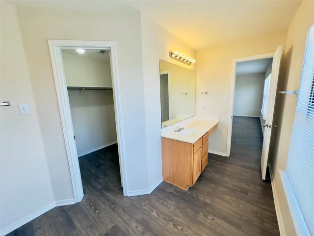 a bathroom with a bathtub and a toilet