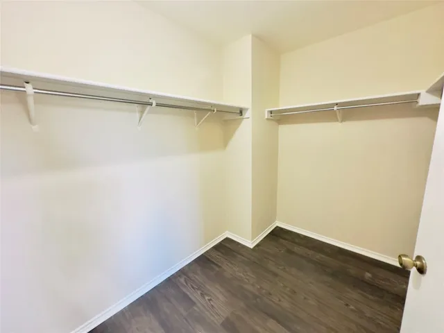 a kitchen with a refrigerator and sink