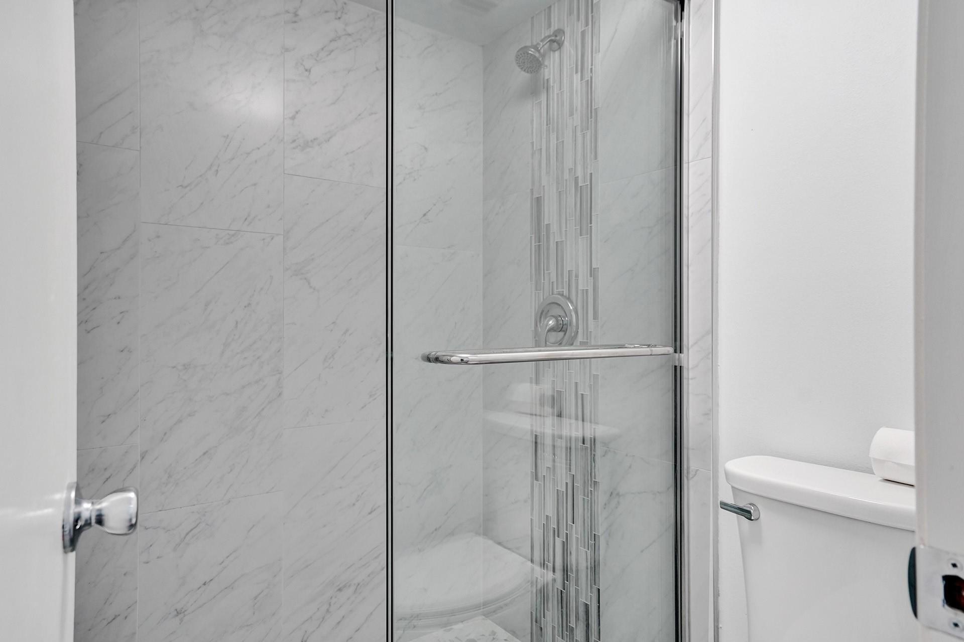 955 Dotterel Road, Unit 2304 Delray Beach, FL 33444 - Photo 19 of 47 a bathroom with a shower