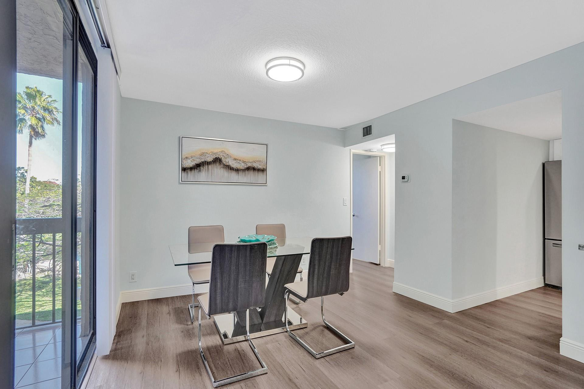 955 Dotterel Road, Unit 2304 Delray Beach, FL 33444 - Photo 26 of 47 a view of a workspace with furniture and a window