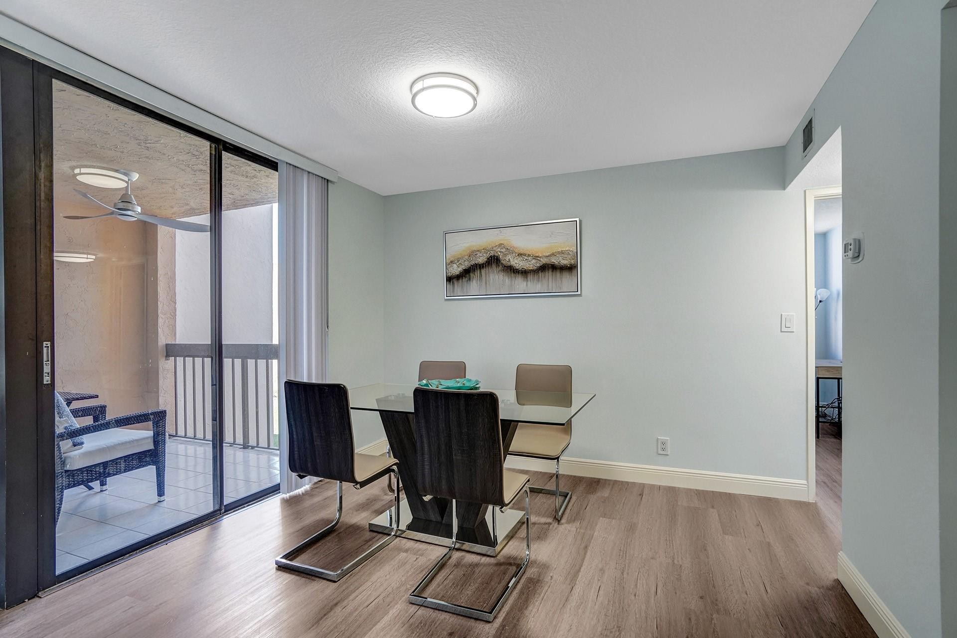 955 Dotterel Road, Unit 2304 Delray Beach, FL 33444 - Photo 27 of 47 a view of a workspace with furniture and a window