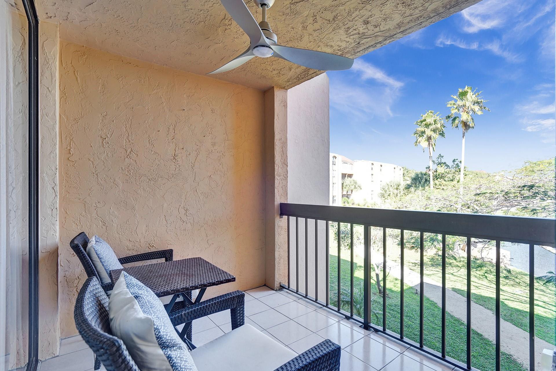 955 Dotterel Road, Unit 2304 Delray Beach, FL 33444 - Photo 4 of 47 a view of a balcony with furniture