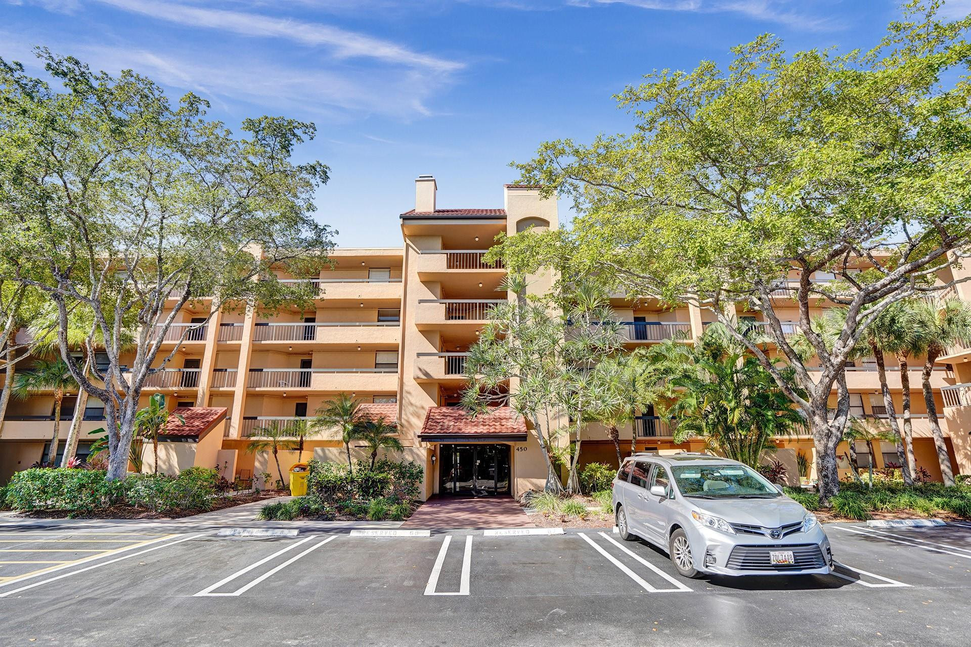 955 Dotterel Road, Unit 2304 Delray Beach, FL 33444 - Photo 47 of 47 front view of a building with a street