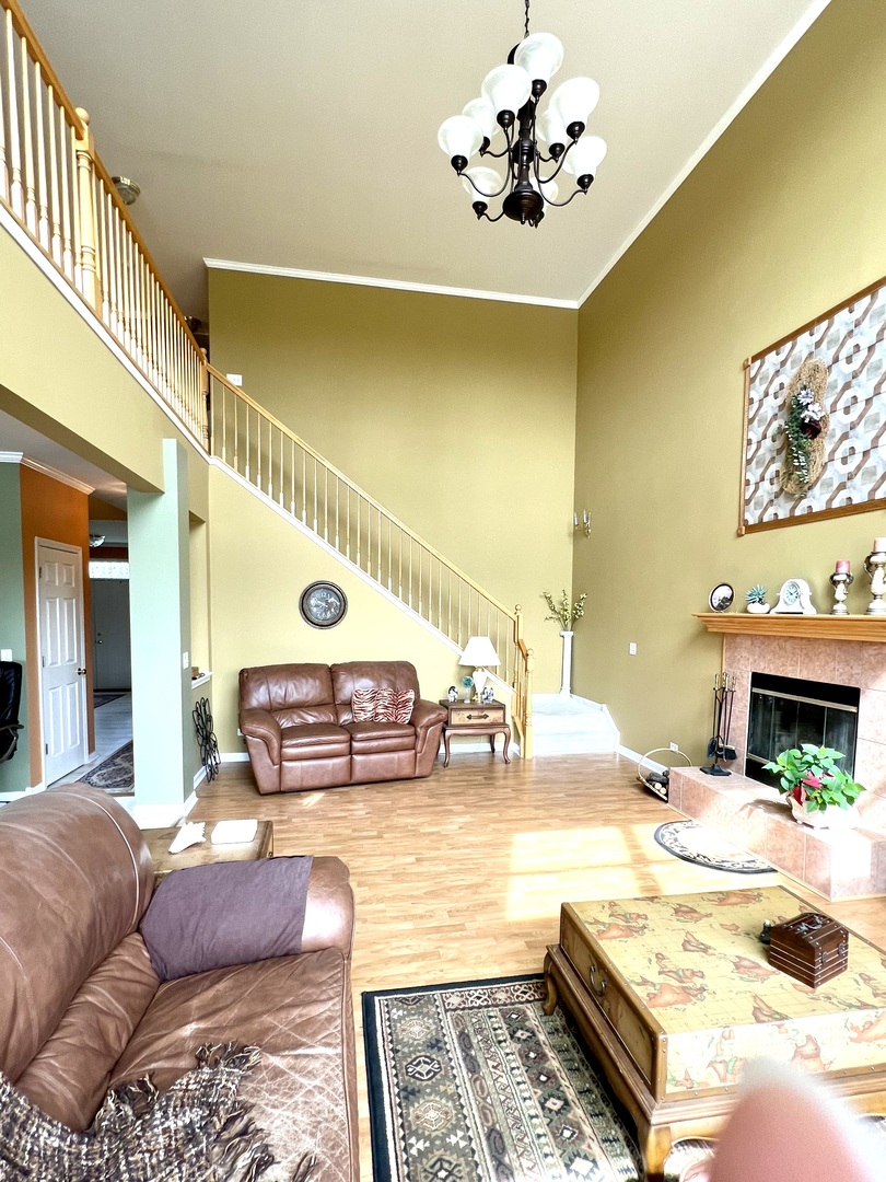 1800 Fulton Lane Sycamore, IL 60178 - Photo 21 of 48 a living room with furniture and a fireplace