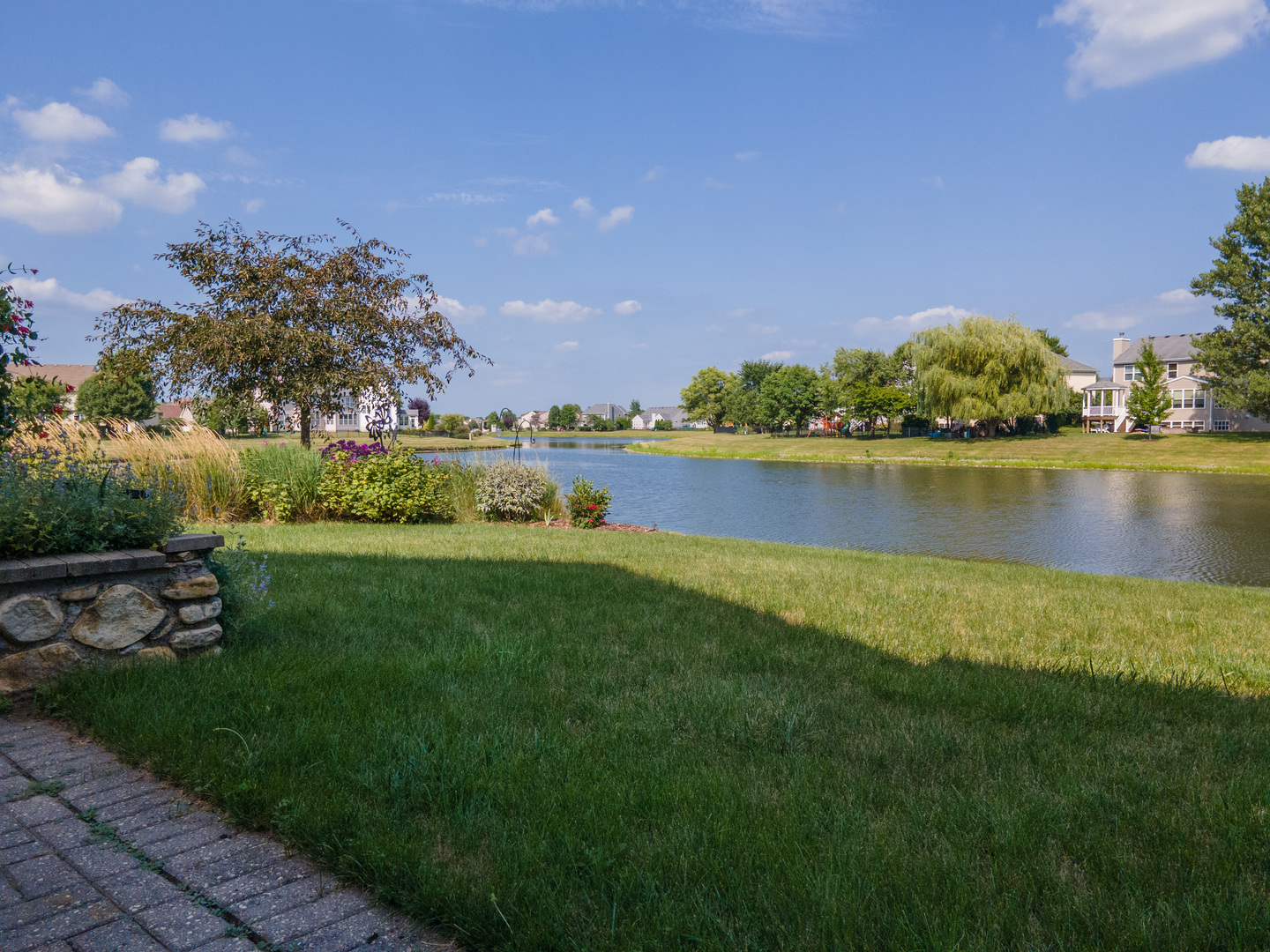 1800 Fulton Lane Sycamore, IL 60178 - Photo 43 of 48 a view of a lake with a city
