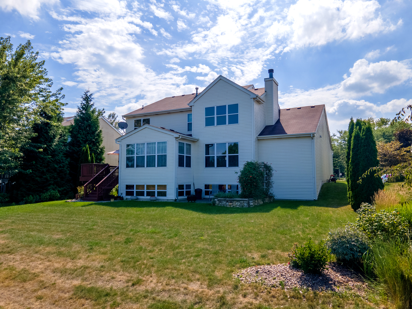1800 Fulton Lane Sycamore, IL 60178 - Photo 5 of 48 a view of a house with a big yard