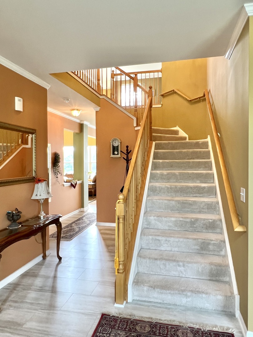 1800 Fulton Lane Sycamore, IL 60178 - Photo 6 of 48 a view of entryway and hall with wooden floor