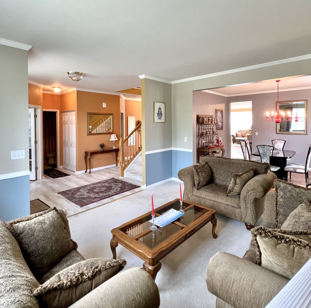 1800 Fulton Lane Sycamore, IL 60178 - Photo 10 of 48 a living room with furniture and a table