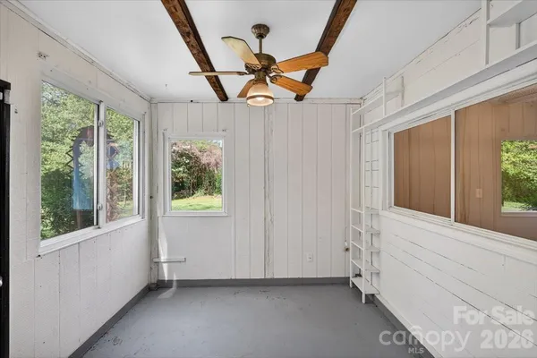 a view of a house with a yard and garage