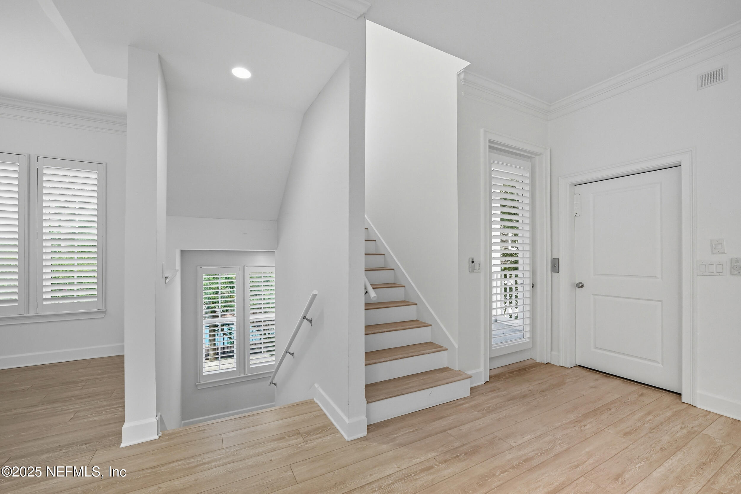 50 Beach Cottage Lane Atlantic Beach, FL 32233 - Photo 21 of 45 Stairwells with Elevator Door to right