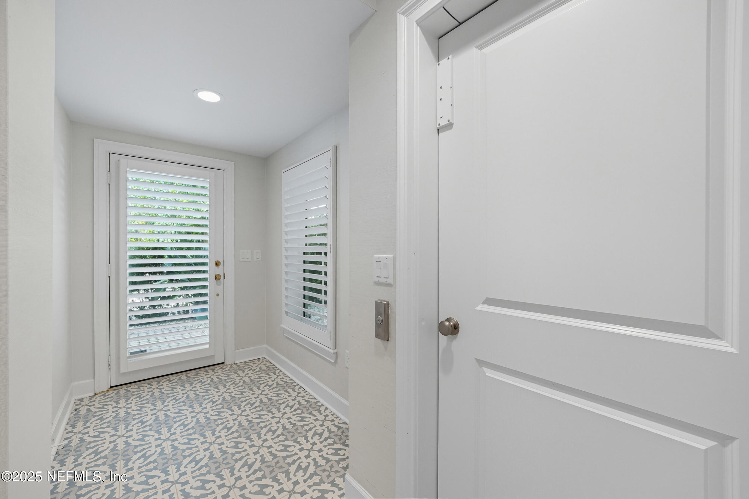 50 Beach Cottage Lane Atlantic Beach, FL 32233 - Photo 4 of 45 Foyer leads to Elevator entry