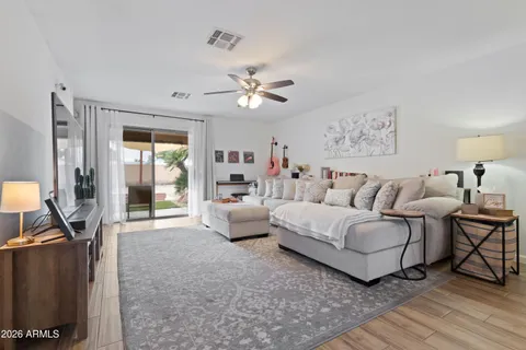 a living room with furniture and a window