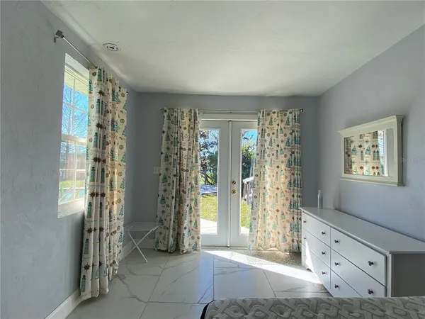 a view of livingroom with furniture and windows