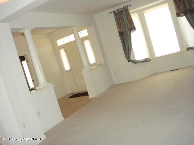 177 Kirkham Road Bushkill, PA 18324 - Photo 6 of 24 Living Room to Entrance Foyer
