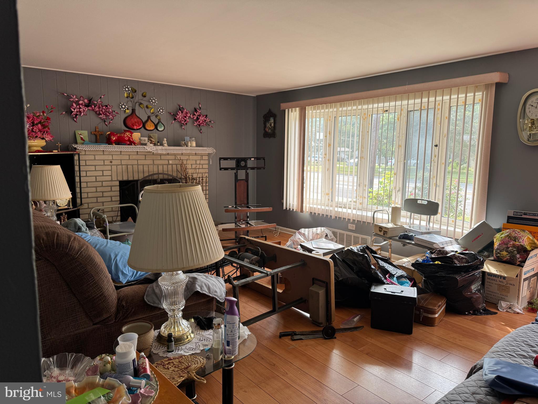 609 Evesham Avenue West Magnolia, NJ 08049 - Photo 12 of 73 a room with furniture or couch and a window