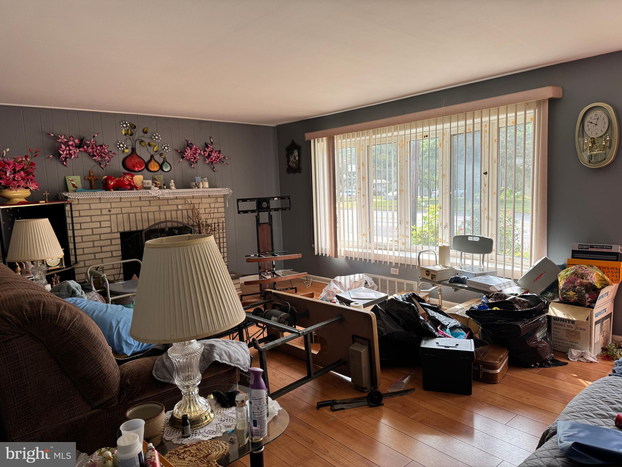 609 Evesham Avenue West Magnolia, NJ 08049 - Photo 18 of 73 a living room with furniture two window and a table