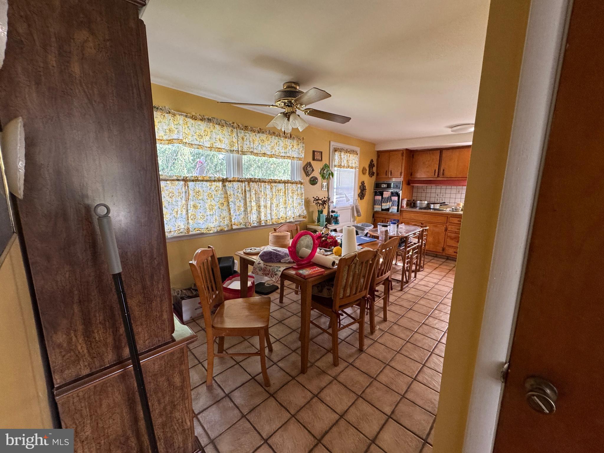 609 Evesham Avenue West Magnolia, NJ 08049 - Photo 20 of 73 a view of a dining room with furniture window and outside view