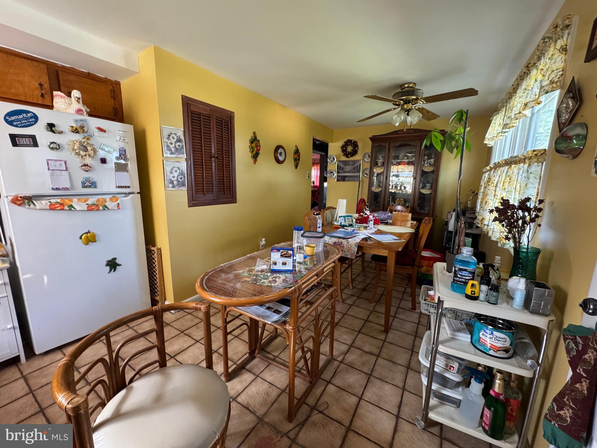 609 Evesham Avenue West Magnolia, NJ 08049 - Photo 25 of 73 a view of a dining room with furniture and chandelier