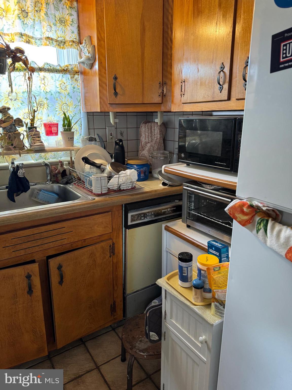 609 Evesham Avenue West Magnolia, NJ 08049 - Photo 27 of 73 a kitchen with sink cabinets and appliances
