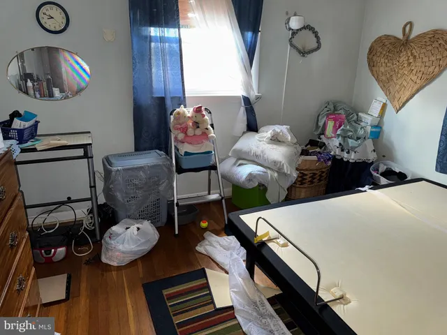 a view of a livingroom with furniture and a table